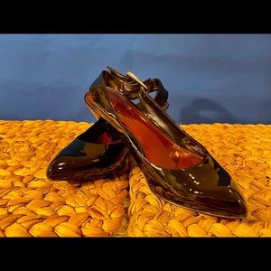 Jessica Simpson black patent leather sling-backs with silver buckle. Worn once!